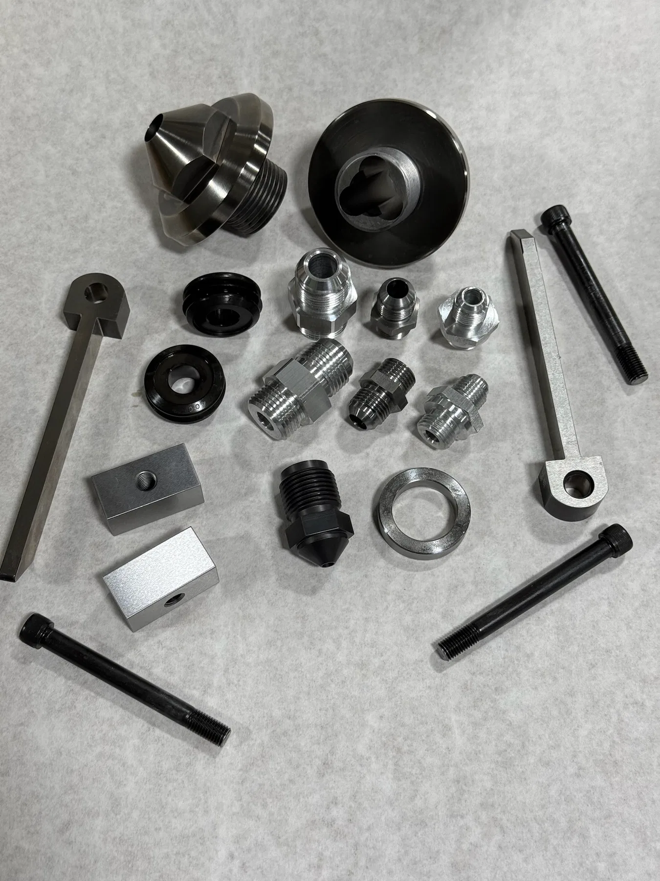 Machined components and project details for CNC quote preparation.