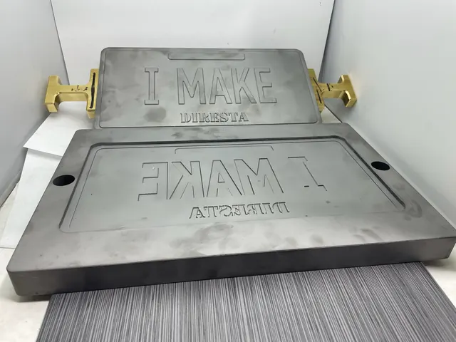 Large embossing die and plate setup.