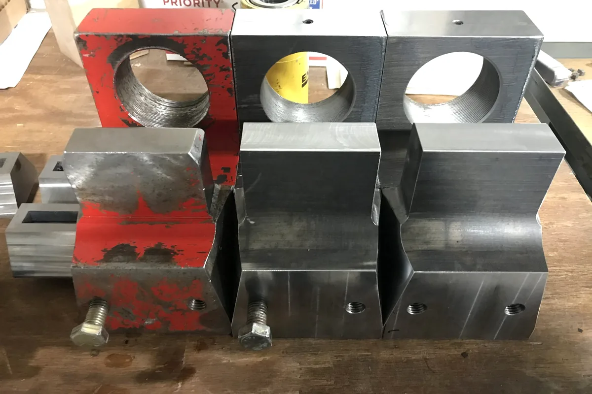 Custom machined blocks and marking tooling for engineering support.