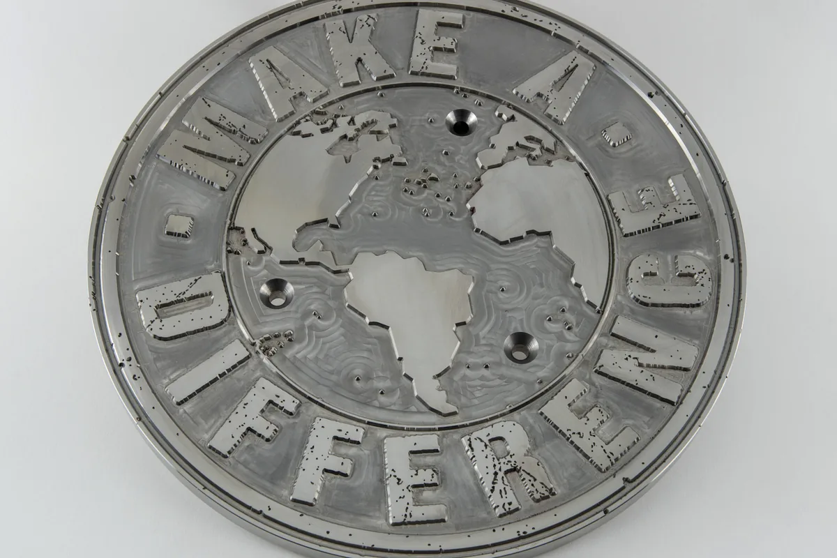 Embossed and engraved sample plate.