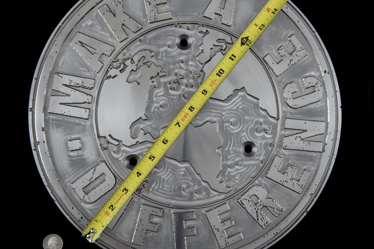 Embossed and engraved sample plate.