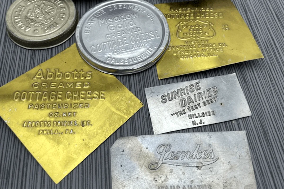 Embossing die and metal plate setup.